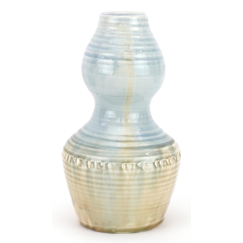 90 - William Moorcroft double gourd vase having a pale blue and beige glaze from the Natural range, 23.5c... 