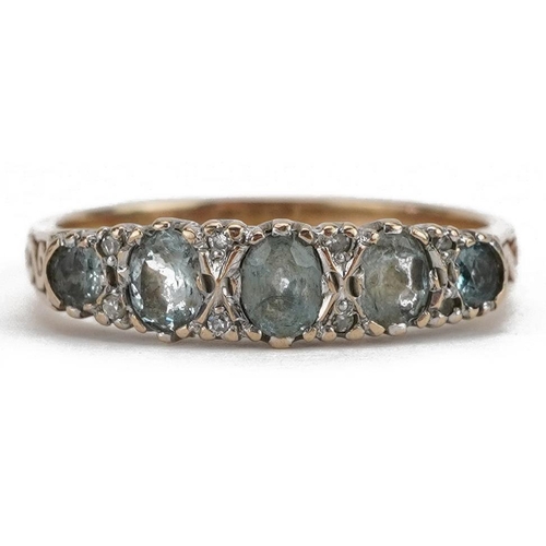 9ct gold graduated aquamarine and diamond ring with scrolled shoulders ...