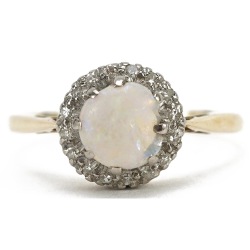 2029 - 18ct gold and platinum opal and diamond cluster ring, the opal approximately 7.0mm in diameter, size... 