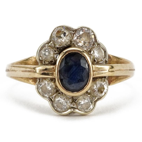 2042 - Art Deco style 9ct gold sapphire and diamond cluster ring, the sapphire approximately 6.0mm x 4.5mm,... 