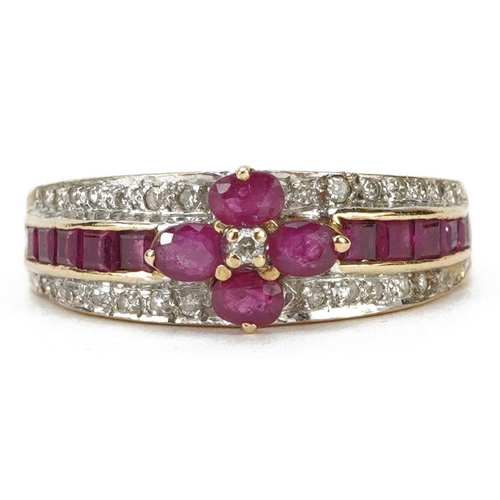 2015 - 9k gold ruby and diamond three tier flower head ring, size Q, 3.0g