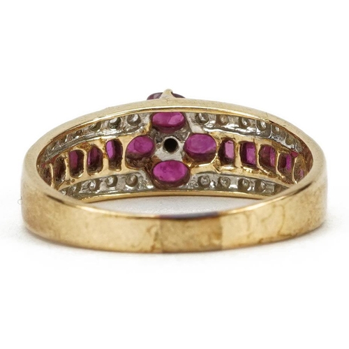 2015 - 9k gold ruby and diamond three tier flower head ring, size Q, 3.0g