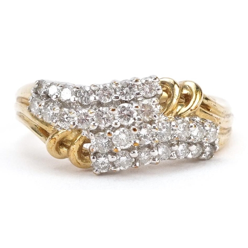 2062 - 9ct gold diamond four row crossover ring, size L, 3.0g