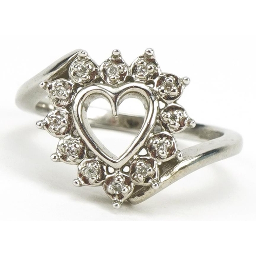 2033 - 9ct white gold diamond love heart crossover ring, size N, 3.7g