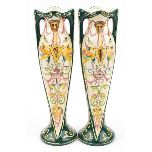 251 - Pair of European Art Nouveau twin handled vases hand painted with stylised animals and faces, each 3... 