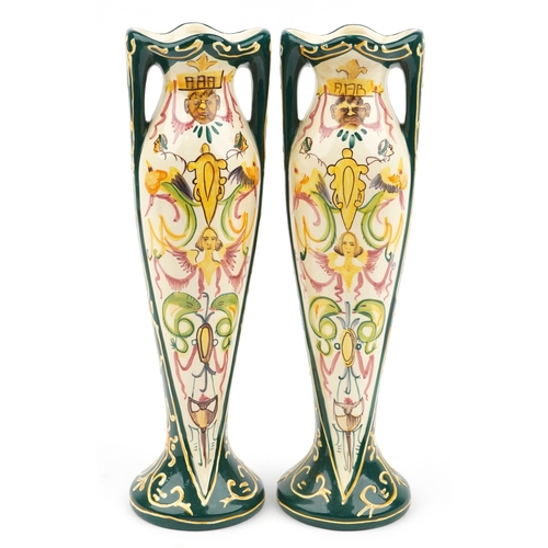 251 - Pair of European Art Nouveau twin handled vases hand painted with stylised animals and faces, each 3... 