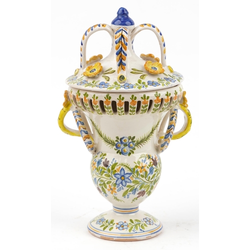 313 - Manises, Spanish Maiolica pierced vase and cover with twin handles hand painted with stylised flower... 