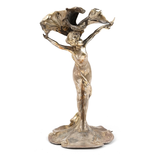 24 - Manner of WMF, Art Nouveau silver plated table lamp in the form of a nude female with outstretched a... 