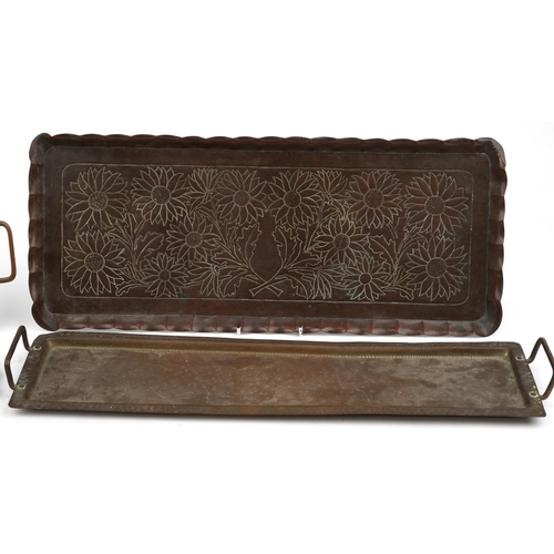 259 - Arts & Crafts metalware including a Newlyn style tray engraved with sunflowers, Keswick style dish e... 