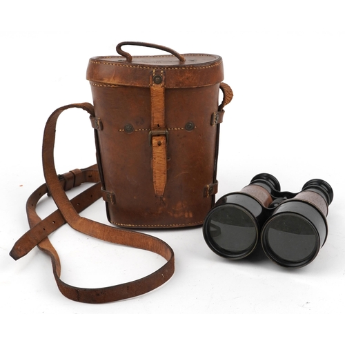 1745 - Pair of military interest World War I leather bound Hezzanith patent binoculars with leather case, i... 