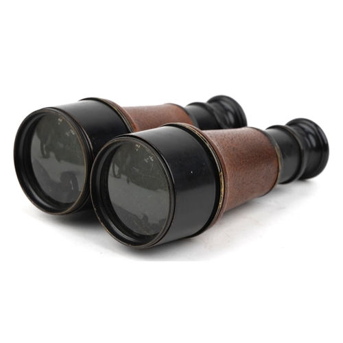 1745 - Pair of military interest World War I leather bound Hezzanith patent binoculars with leather case, i... 