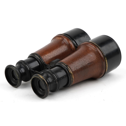 1745 - Pair of military interest World War I leather bound Hezzanith patent binoculars with leather case, i... 