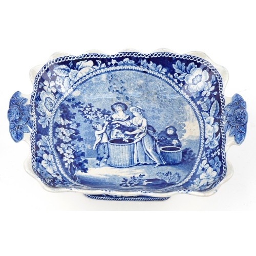 62 - Early 19th century blue and white pottery comport transfer printed with hop pickers, 26cm wide