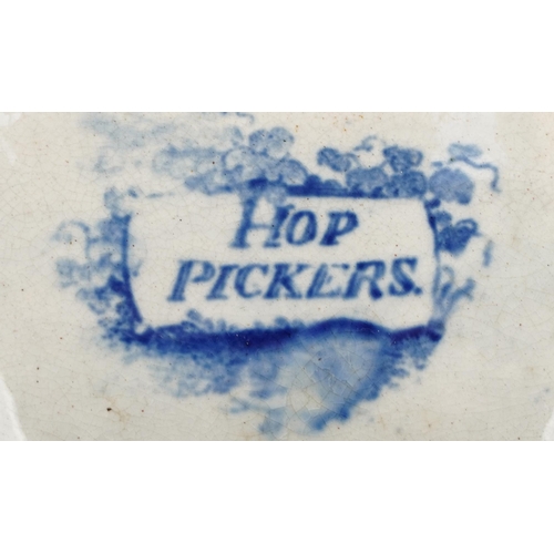 62 - Early 19th century blue and white pottery comport transfer printed with hop pickers, 26cm wide