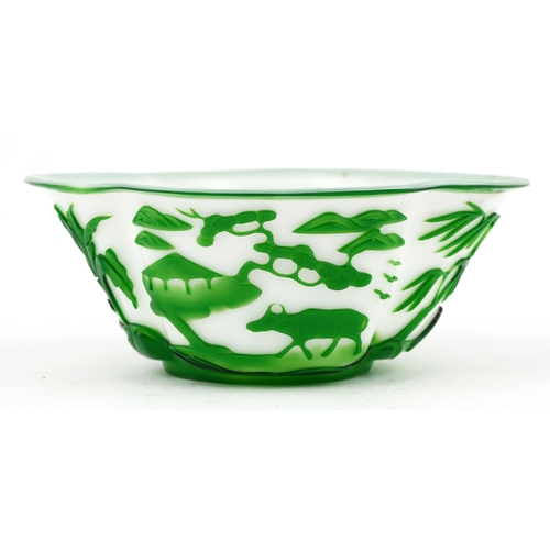 332 - Chinese Peking cameo glass bowl carved with animals in a landscape, 21cm wide