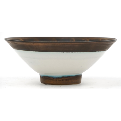 252 - Peter Wills, Raku studio pottery footed bowl, 22cm in diameter