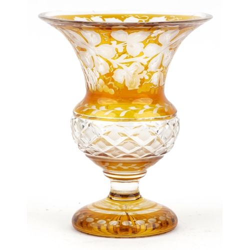 68 - Bohemian amber flashed cut glass vase etched with leaves and berries, 16.5cm high