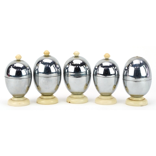 391 - Five vintage Heatmaster egg coddlers, the largest each 10cm high