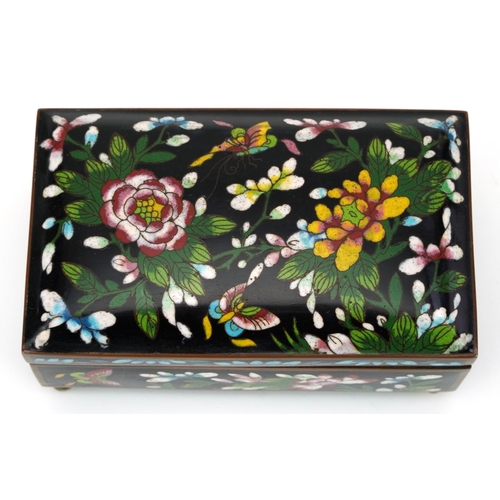 106 - Japanese cloisonne casket enamelled with butterflies amongst flowers, 7.5cm H x 15.5cm D x 9cm D