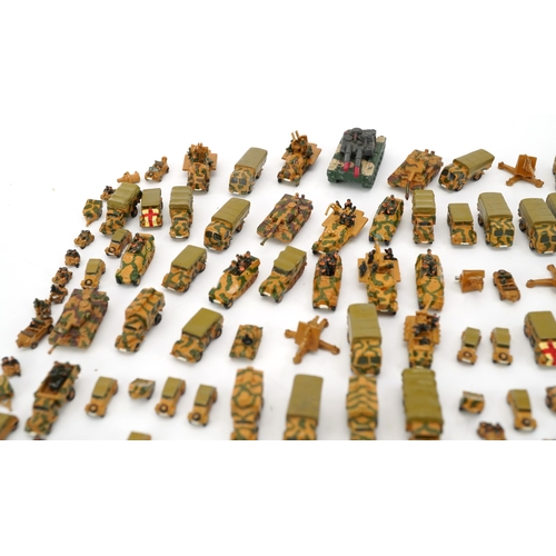 1547 - Collection of miniature hand painted diecast model railway army vehicles, the largest 3.5cm in lengt... 