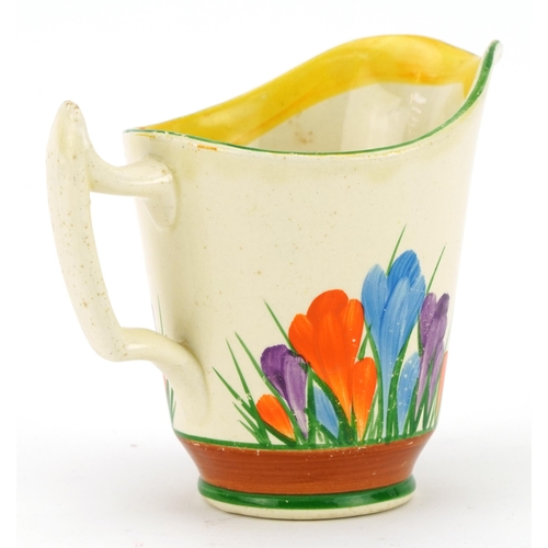 249 - Clarice Cliff, Art Deco Bizarre jug hand painted in the Crocus pattern, 10.5cm high