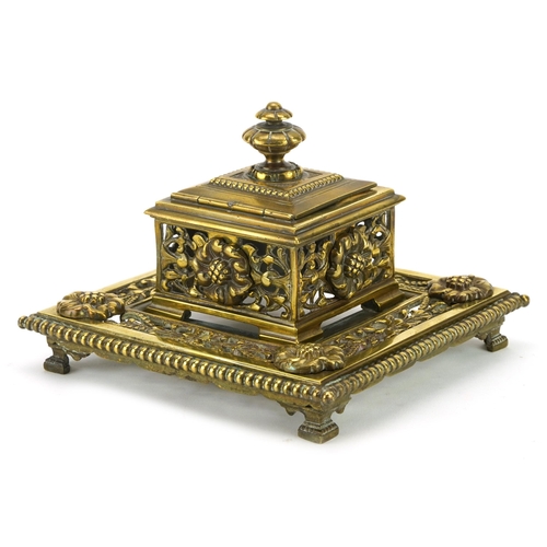 186 - Victorian pierced brass desk inkwell with flower heads and ceramic liner, 16.5cm x 16.5cm