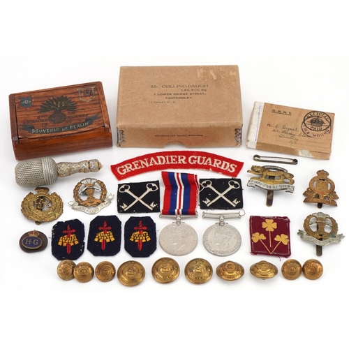 1727 - Militaria including World War II medal with box of issue, Grenadier Guards shoulder title, cap badge... 