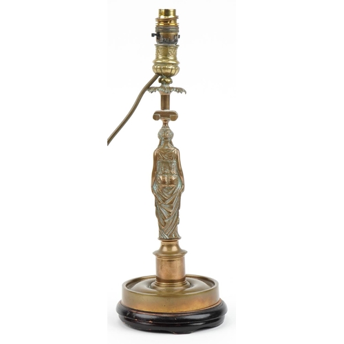 234 - Patinated bronze table lamp in the form of a classical female holding her dress, 42.5cm high