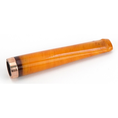 243 - Butterscotch amber cigarette holder with 9ct gold mount and velvet lined tooled leather case, 6.5cm ... 