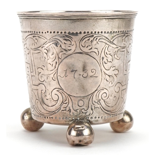 75 - Antique silver cup with three ball feet and engraved decoration, possibly Russian, indistinct impres... 