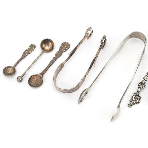 512 - Victorian and later silver and white metal cutlery including a pair of scorpion design sugar nips, m... 