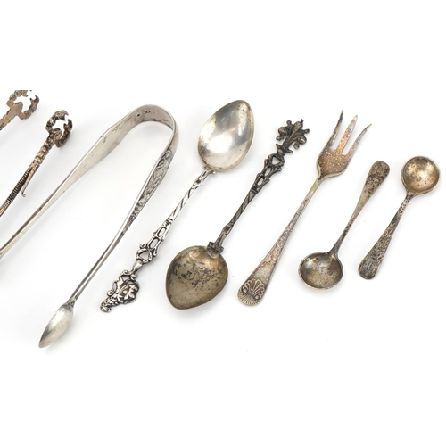 512 - Victorian and later silver and white metal cutlery including a pair of scorpion design sugar nips, m... 