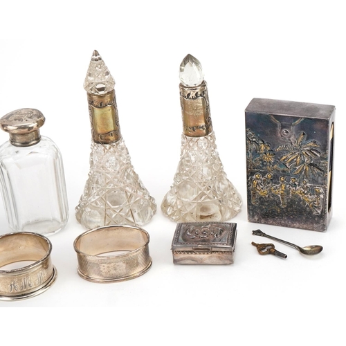 517 - Silver and white metal objects including a pair of cut glass scent bottles with silver collars, circ... 