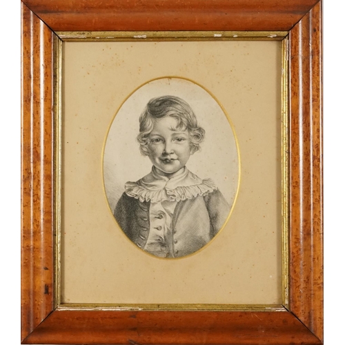 376 - Head and shoulders portrait of a young child, 19th century oval charcoal, various indistinct inscrip... 