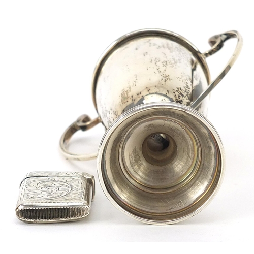 311 - Victorian and later silver objects comprising preserve spoon, trophy with twin handles and vesta, va... 