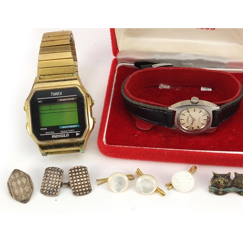 2367 - Two vintage wristwatches and a collection of cufflinks and studs, some silver