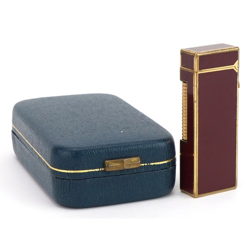 354 - Dunhill gold plated and red enamel pocket lighter with box