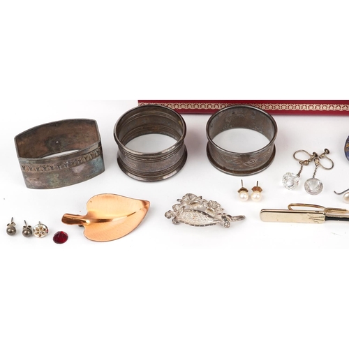 2588 - Antique and later jewellery and objects including silver napkin rings, garnet earrings, silver brooc... 