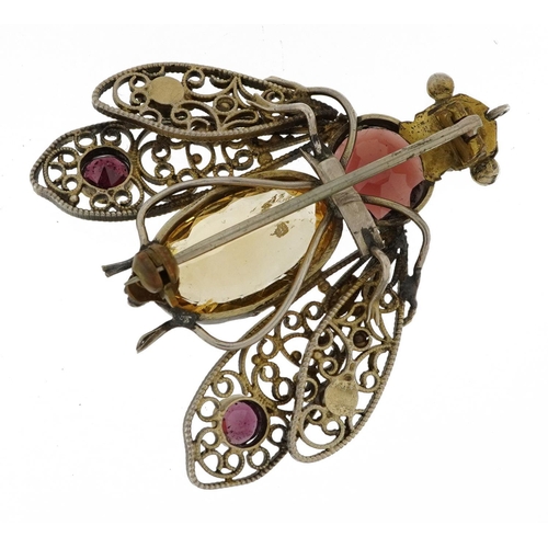 2036 - Unmarked silver filigree fly brooch set with semi precious stones including garnet, yellow topaz and... 