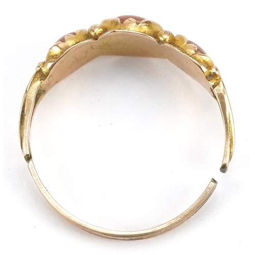 2003 - Antique unmarked gold coral three stone ring with engraved shoulders, tests as 15ct gold, size P, 2.... 
