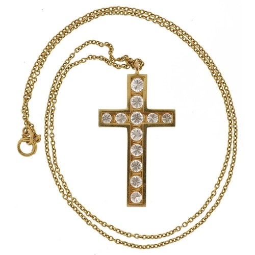 2004 - Unmarked gold cross pendant set with twelve diamonds of varying sizes, the largest diamond approxima... 