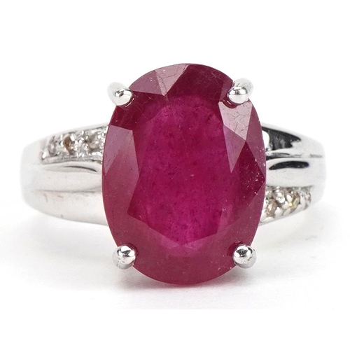 2046 - 9ct white gold ruby solitaire ring with diamond set shoulders, the ruby approximately 13.3mm x 9.9mm... 