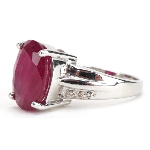 2046 - 9ct white gold ruby solitaire ring with diamond set shoulders, the ruby approximately 13.3mm x 9.9mm... 