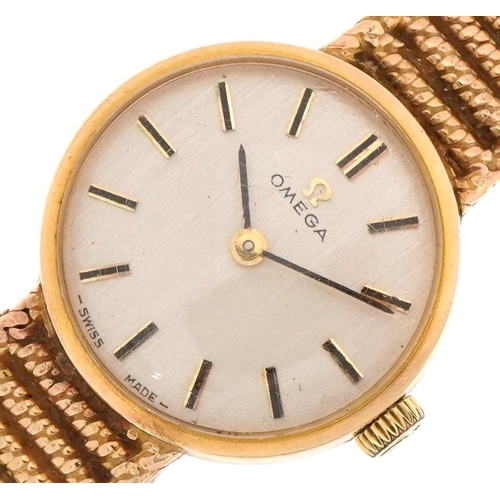 2009 - Omega, ladies 9ct gold wristwatch with 9ct gold strap, the case 20mm in diameter, total 23.4g