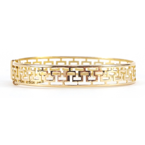 2107 - 14ct gold Greek key design bangle, 6.2cm wide, 12.2g