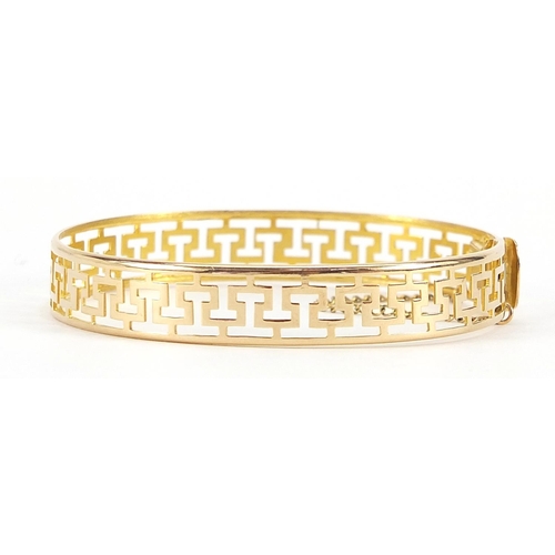 2107 - 14ct gold Greek key design bangle, 6.2cm wide, 12.2g