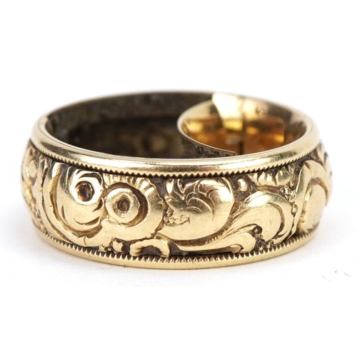 2035 - Georgian unmarked gold repousse band mourning ring with hidden locket compartment, tests as 22ct gol... 