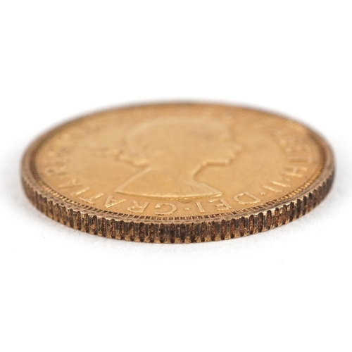31 - Elizabeth II 1963 gold sovereign - this lot is sold without buyer’s premium, the hammer price is the... 