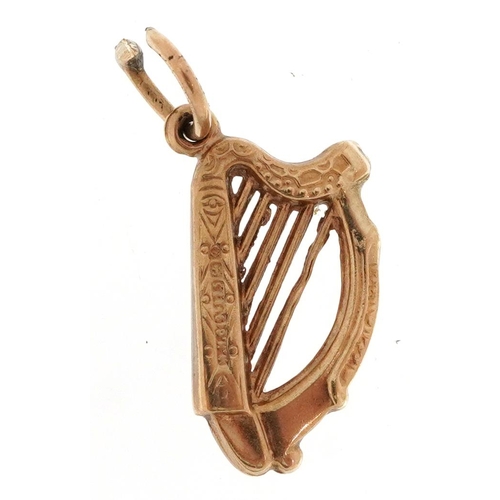 2312 - 9ct gold harp charm, 1.8cm high, 0.5g