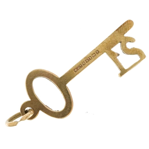 2332 - 9ct gold 21 key charm, 2.5cm high, 0.6g